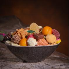The bowl with chocolates and macaroons - La Biscuiterie Lolmede